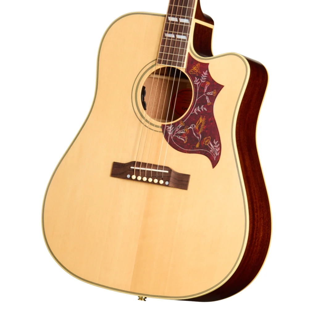 Epiphone Hummingbird Standard EC natural acoustic guitar with a sunburst finish and decorative pickguard, shown from front view.