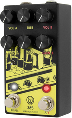Walrus Audio 385 Overdrive mkII yellow effects pedal with control knobs and input/output jacks on a pedalboard.