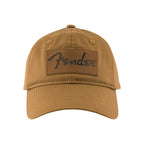 Fender Vintage Badge Hat in caramel color, featuring a classic guitar brand logo, casual accessory with adjustable strap.