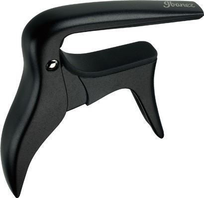 Ibanez ICC10 classical guitar capo in matte black, showing its adjustable design and sleek finish on a guitar.