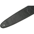 Black Fender Artisan Crafted 2.5-inch leather guitar strap with detailed stitching and adjustable ends.