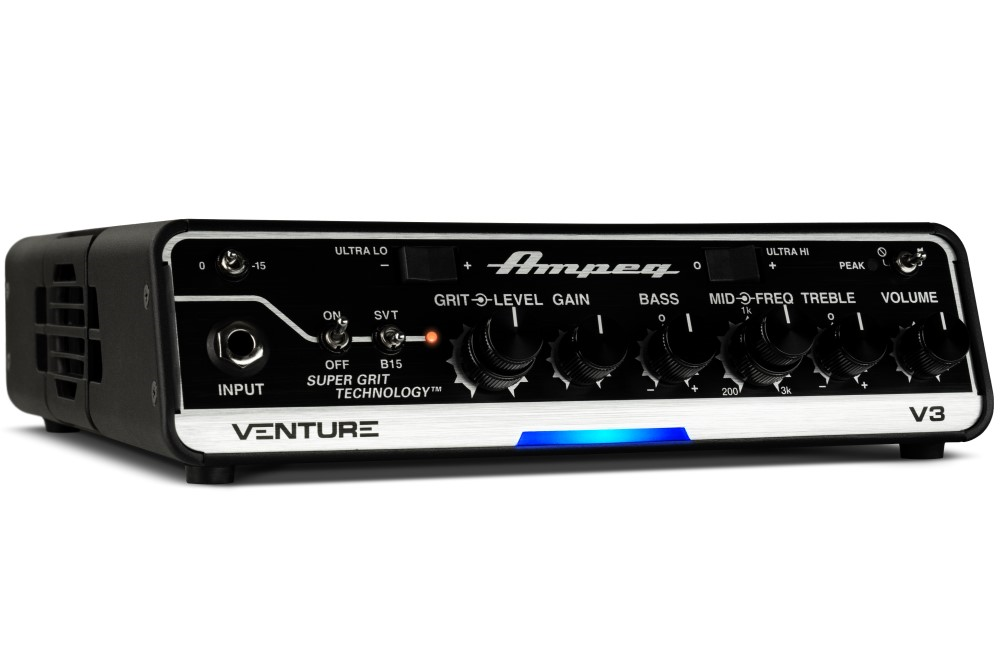 Ampeg Venture V3 300W compact bass amplifier head with control knobs and connected cables on a white background.