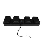 AirTurn QUAD 500 MIDI controller with foot pedals, black compact design, used for music performance and digital page turning.