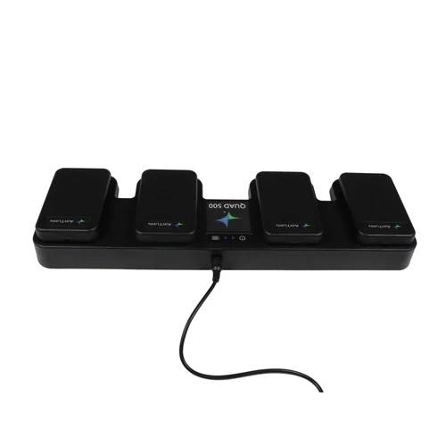 AirTurn QUAD 500 MIDI controller with foot pedals, black compact design, used for music performance and digital page turning.