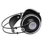 Open-back AKG K702 reference studio headphones with large ear cups and adjustable headband for comfortable mixing and monitoring.