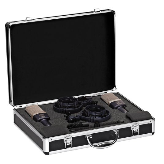 Pair of AKG C314 studio condenser microphones with black bodies and silver grilles, set against a neutral background.