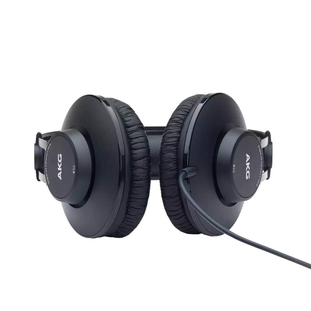 AKG K52 closed-back studio headphones with over-ear design and padded headband, black color, and large ear cups for comfortable listening.