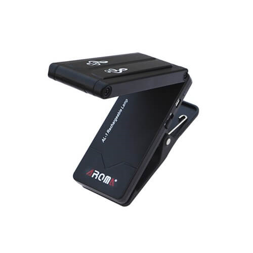 Toms Line Aroma AL-1 compact foldable rechargeable LED stand lamp on a music stand for reading or practice.
