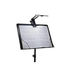 Toms Line Aroma AL-1 compact foldable rechargeable LED stand lamp on music stand, providing adjustable lighting for musicians.