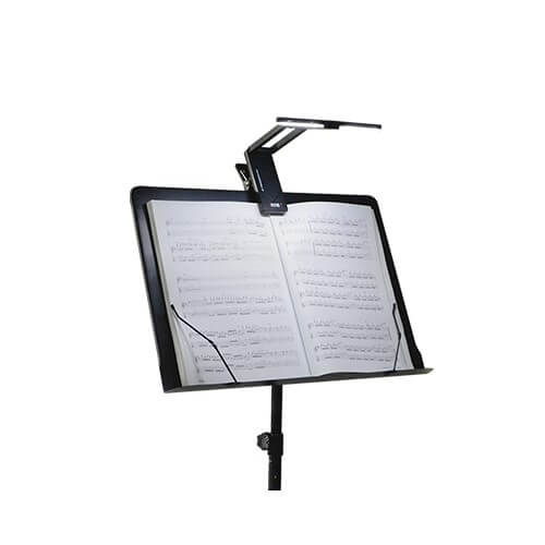 Toms Line Aroma AL-1 compact foldable rechargeable LED stand lamp on music stand, providing adjustable lighting for musicians.