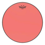 Red Remo Colortone Emperor 14-inch drum head with black logo and colorful design, suitable for drum kits.
