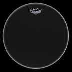 Remo Ambassador Ebony 16-inch drumhead, durable drum head for percussion instruments, shown on a drum kit.