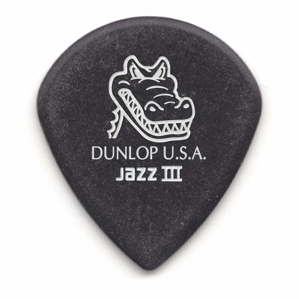 Jim Dunlop Gator Grip Jazz III guitar picks in a player pack, featuring multiple picks with textured grip surfaces for precise playing.