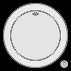 Remo Powerstroke 3 white 24-inch bass drumhead for drum kits, showing the smooth surface and branding on the drumhead.