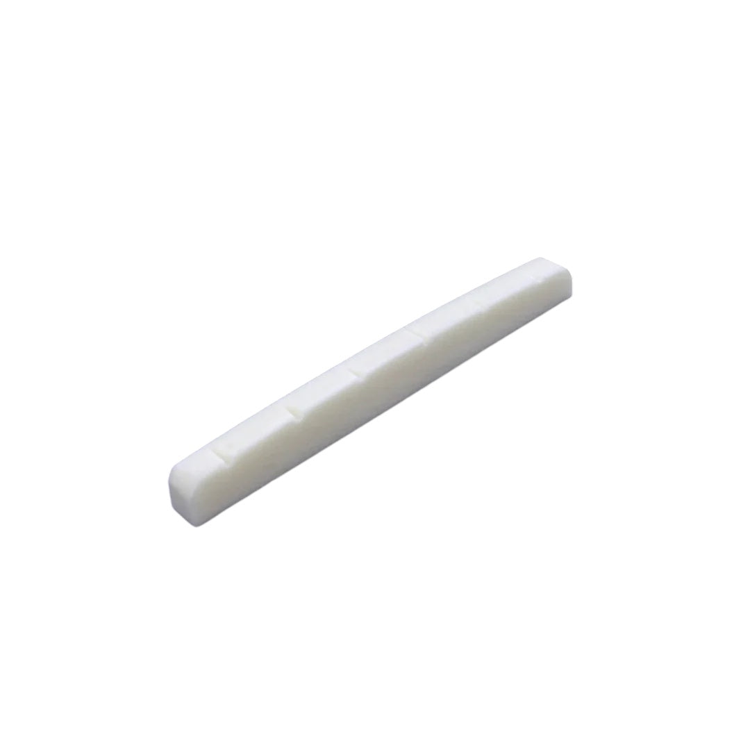 Allparts slotted bone guitar nut with flat bottom, showcasing smooth, precision-cut slot for improved string alignment and tone.