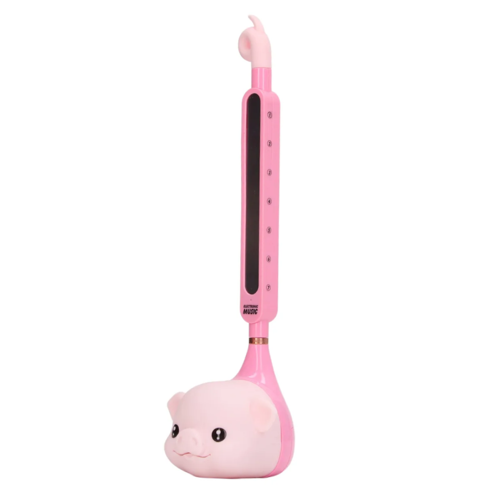 A-Pro Otamatone portable electronic synthesizer in pink pig design, a fun gifts and novelty item with a playful, musical appearance.