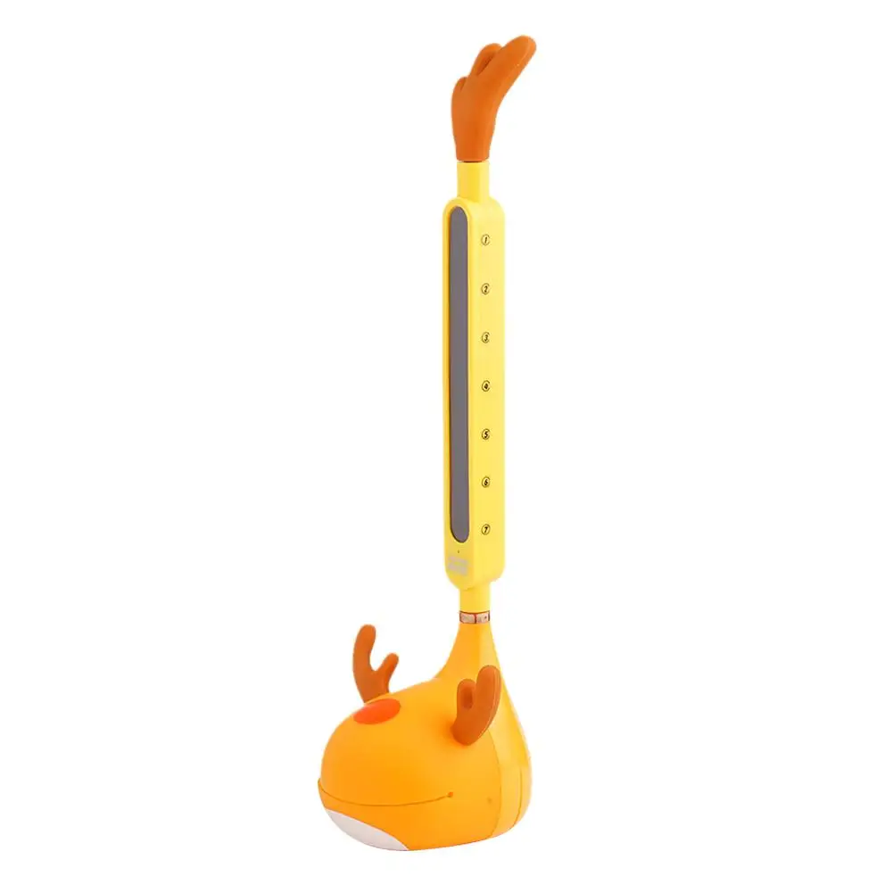 A-Pro Otamatone portable electronic synthesizer in yellow deer design, a fun gift and novelty item with a playful appearance.