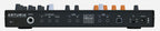 Arturia Microfreak hybrid synthesizer keyboard with colorful control panel and various knobs and keys in a studio setting.