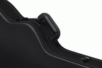 Gibson ES-335 modern electric guitar in a hardshell case, showing the sturdy black exterior and padded interior for protection.