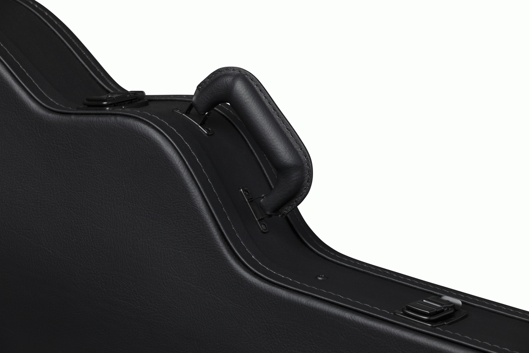 Gibson ES-335 modern electric guitar in a hardshell case, showing the sturdy black exterior and padded interior for protection.