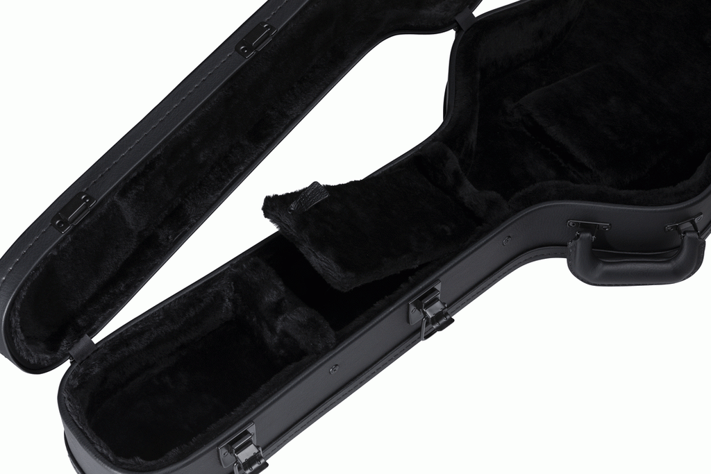 Gibson ES-335 modern electric guitar hardshell case with black exterior and sturdy handle, designed for secure guitar protection.