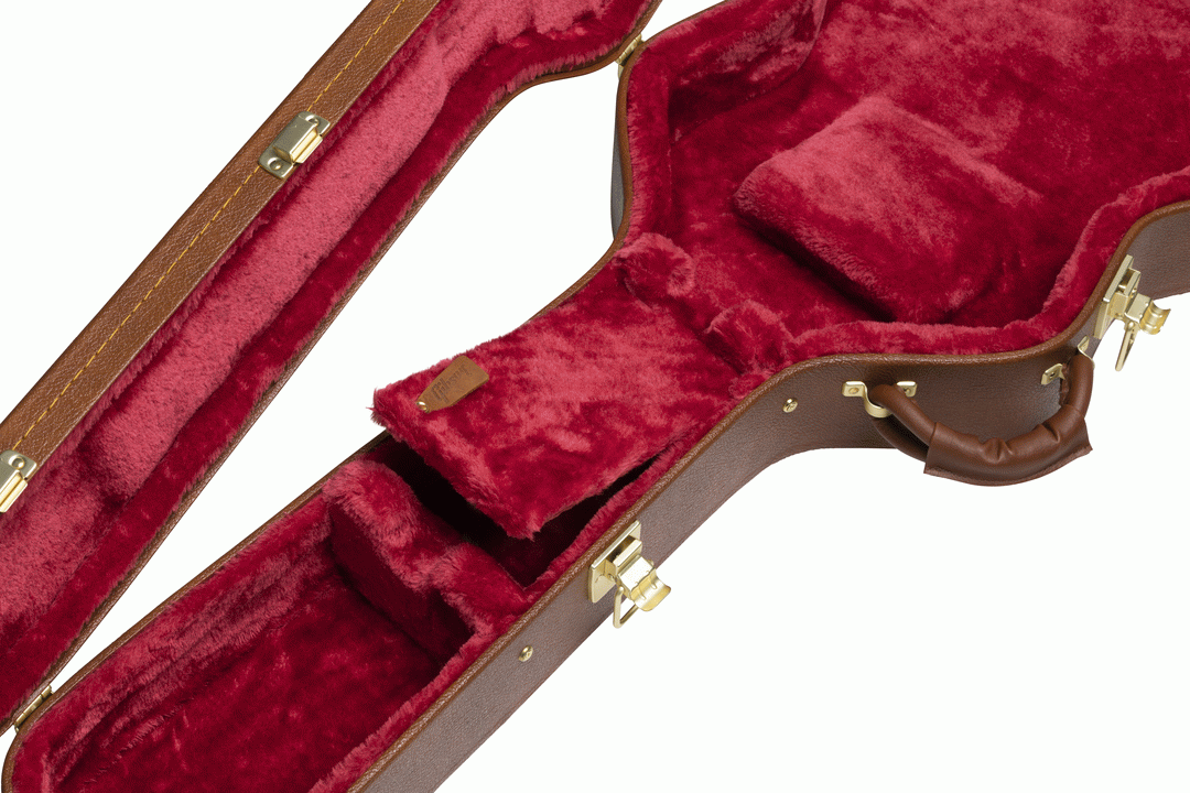 Gibson ES-335 electric guitar in a Gibson hardshell case, showcasing the protective interior and classic guitar design.