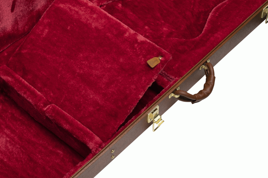 Gibson Firebird Modern electric guitar hardshell case showing sturdy black exterior and padded interior for guitar protection.