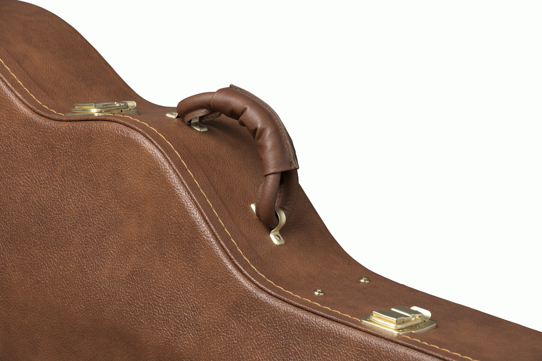 Gibson J185 acoustic guitar in a hardshell case, showing the padded interior and sturdy exterior for protection.