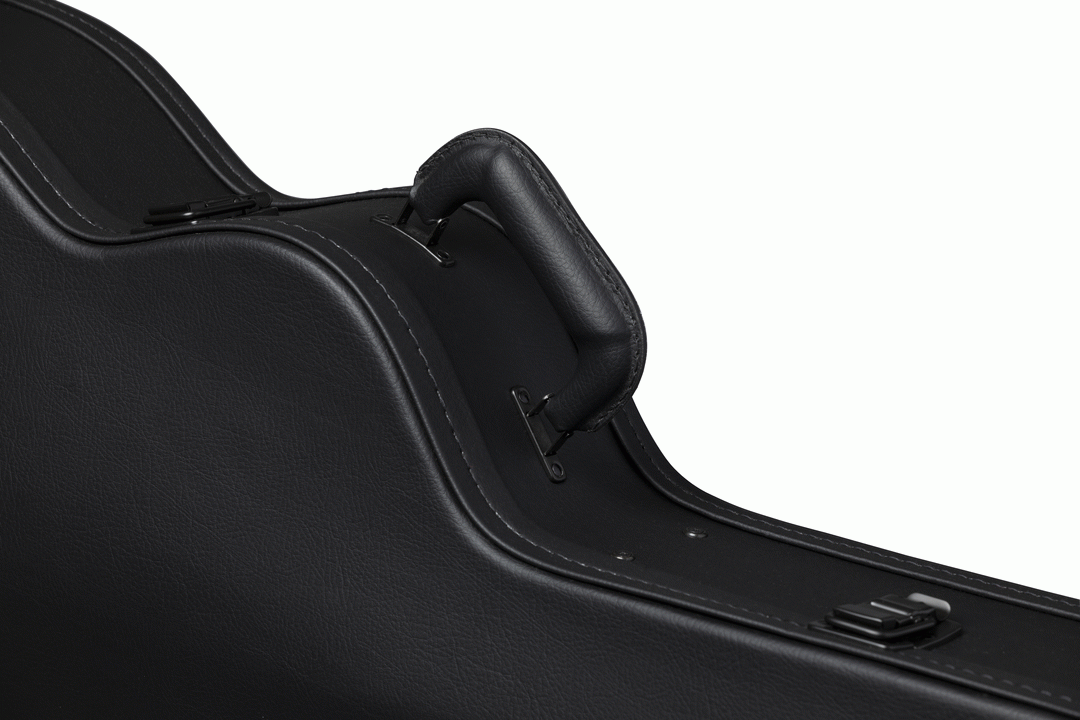Gibson smallbody acoustic guitar in a modern hardshell case, padded interior, black exterior, and secure latches for protection.