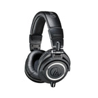 Audio Technica M50X studio monitoring headphones in black, closed-back design with over-ear cushions for professional sound.