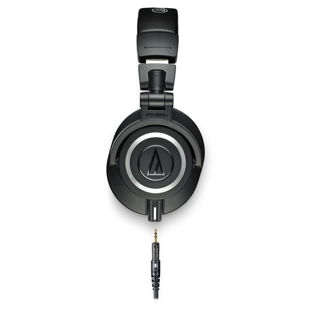 Audio Technica M50X black studio monitoring headphones with closed-back design and over-ear cushions.