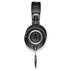 Audio Technica M50X black studio monitoring headphones with closed-back design and over-ear cushions.