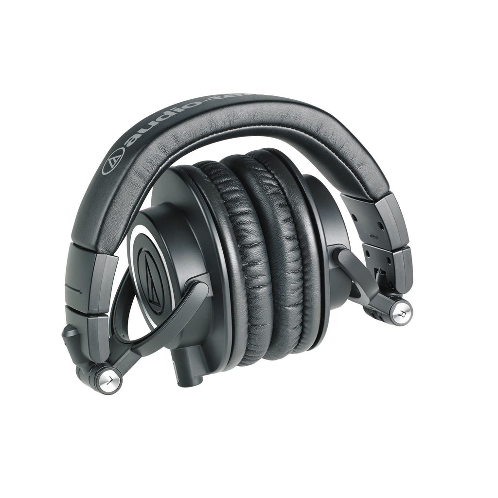 Audio Technica M50X studio monitoring headphones in black, closed-back design with padded ear cups and adjustable headband.