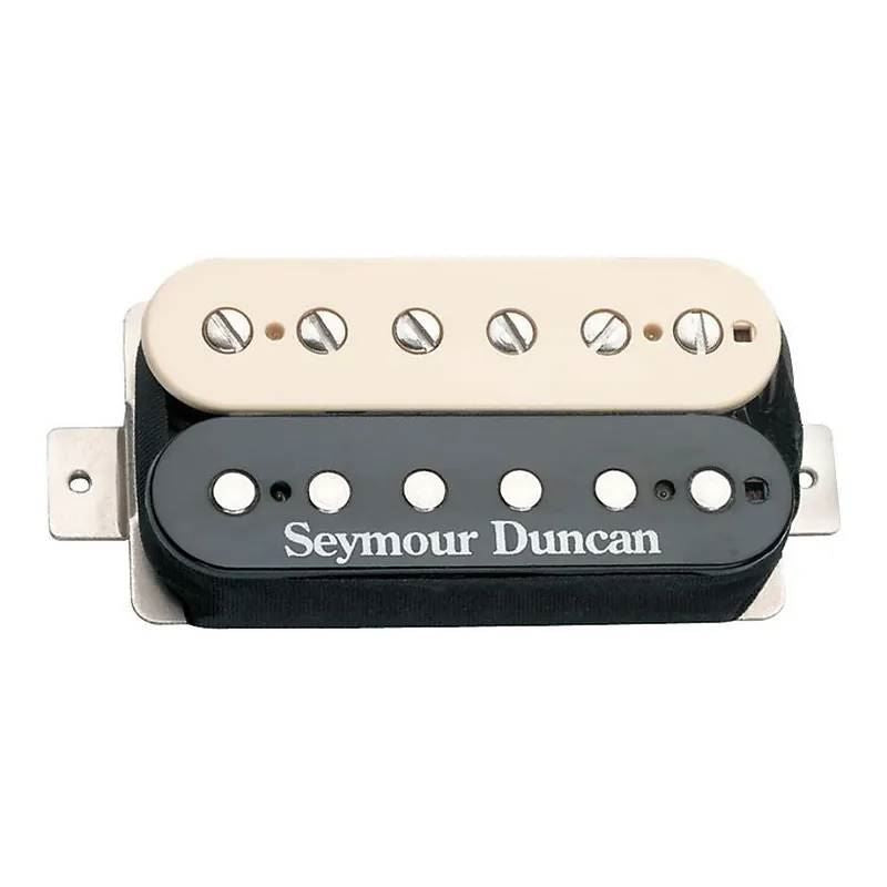 Seymour Duncan SH-2N Jazz Model Zebra pickup showing black and white striped coil for electric guitar tone enhancement.