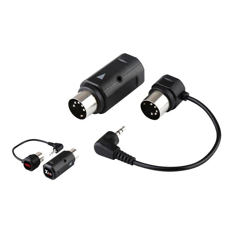 Xvive MD1 Bluetooth MIDI wireless adaptor connected to a musical keyboard with data cables for seamless MIDI data transfer.