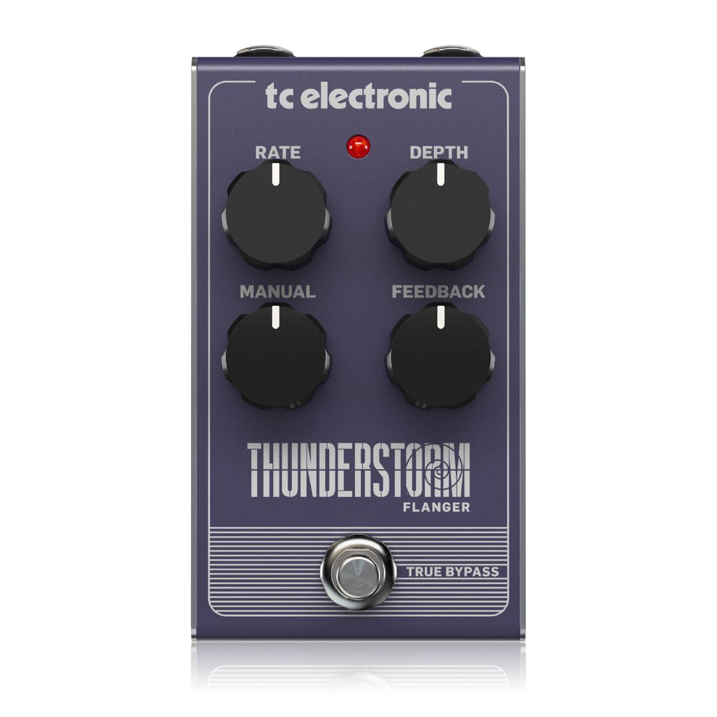 TC Electronic Thunderstorm vintage-style flanger guitar effects pedal with knobs and switches on a black pedalboard surface.