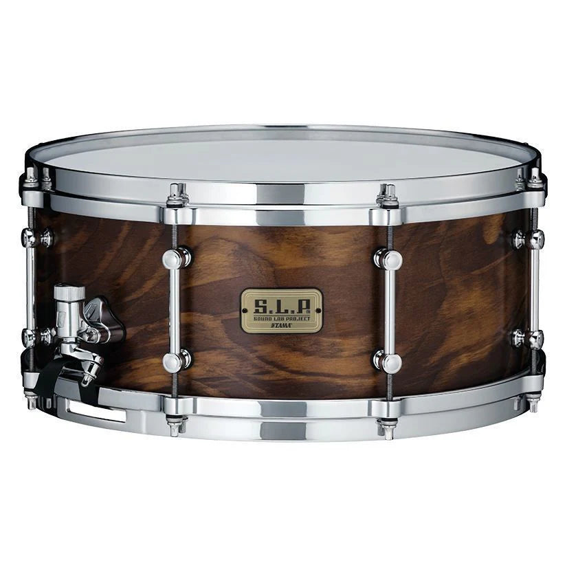 Tama Sound Lab Fat Spruce 14x6 snare drum with a natural wood finish and chrome hardware, showcasing the drum's textured surface.