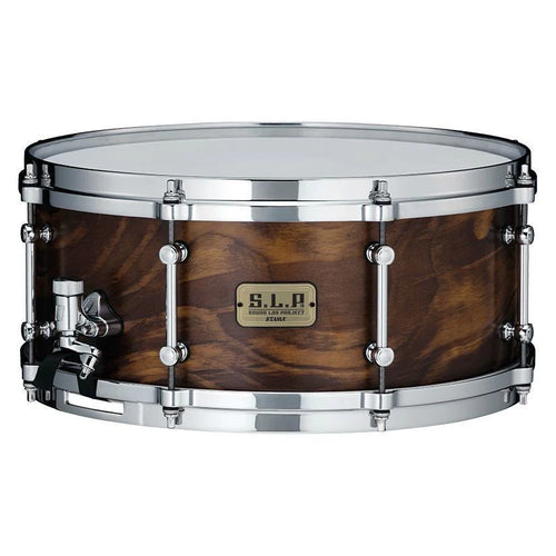 Tama Sound Lab Fat Spruce 14x6 snare drum with a natural wood finish and chrome hardware, showcasing the drum's textured surface.