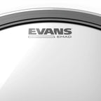 Evans 24-inch EMAD clear bass drumhead for drums, showing the drumhead with Evans branding and clear surface.