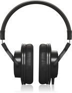 Behringer BH20 closed-back studio headphones with cushioned ear cups and adjustable headband, designed for comfortable audio monitoring.