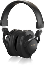 Behringer BH20 closed back studio headphones with cushioned ear cups and adjustable headband, designed for professional audio monitoring.
