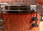 Mapex Black Panther Design Lab 4-piece drum kit with peach burl burst finish, including 22, 12, 14, and 16-inch shells.