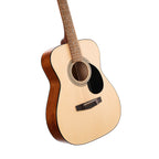 Cort AF510 OP Folk acoustic guitar in open pore natural finish with a gig bag, showcasing a full view of the instrument.