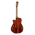 Cort Gold A10 Cocobolo GA acoustic guitar with natural finish and case, showcasing the guitar's body and wood details.