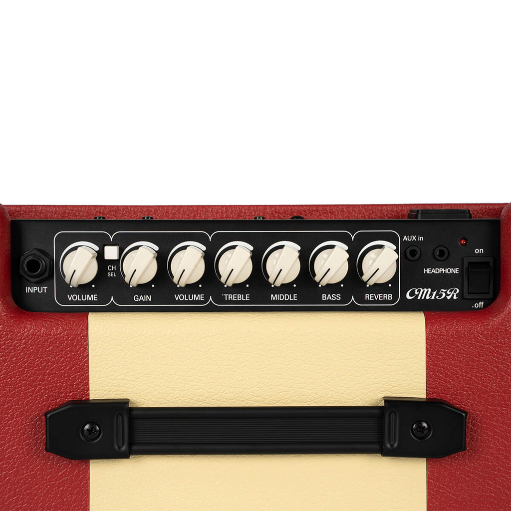 Cort CM15R PG 15W guitar combo amplifier in dark red with control knobs and speaker grille, designed for electric guitar use.