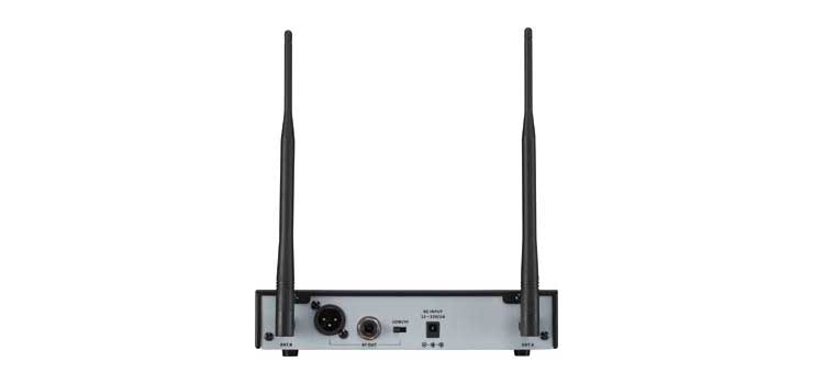 Okayo C7281A dual channel UHF wireless audio link receiver with antennas, displaying frequency range 520-544MHz.