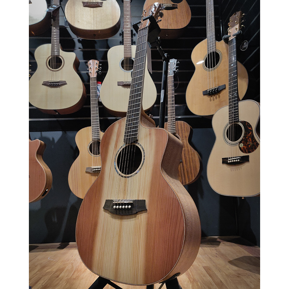 Cole Clark Studio GA AN1EC acoustic guitar with redwood face and maple back and sides, showcasing its natural wood finish.