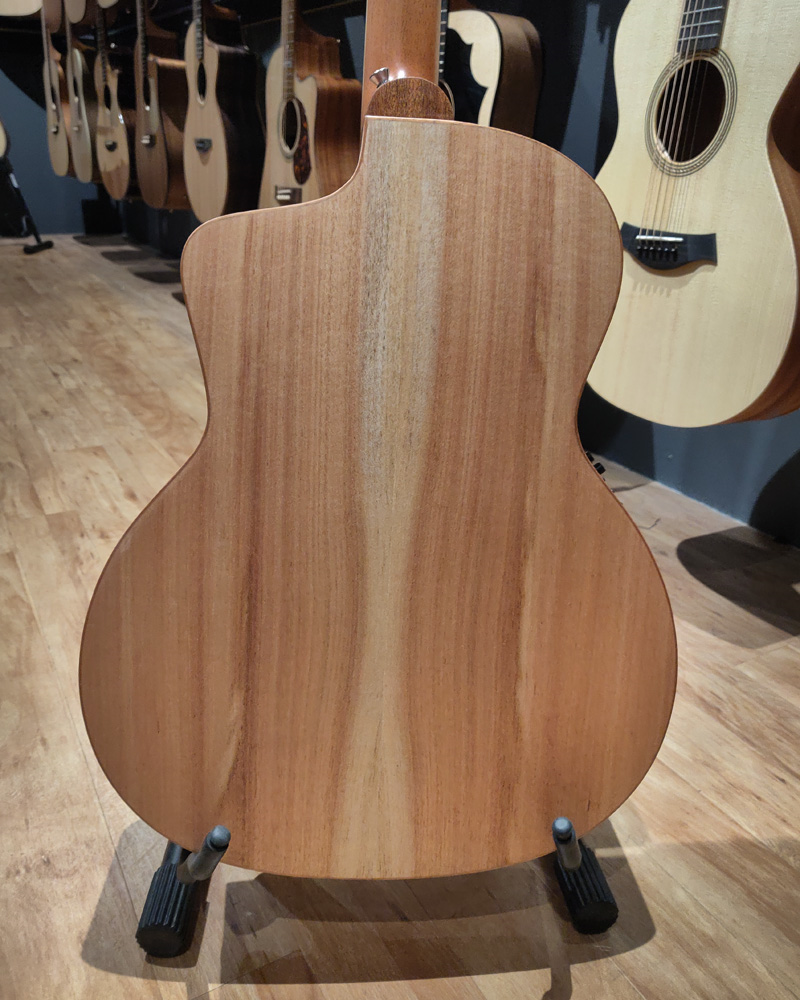 Cole Clark Studio GA AN1EC acoustic guitar with a Redwood face and maple back and sides, showcasing its natural wood finish and body shape.