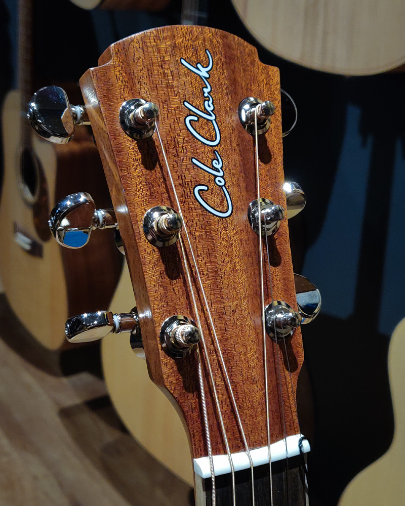 Cole Clark Studio GA AN1EC acoustic guitar with redwood top, maple back and sides, featuring a natural finish and cutaway design.