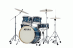 Tama Superstar Classic 20-inch 5-piece drum kit shell pack in blue lacquer burst with drums and hardware visible.